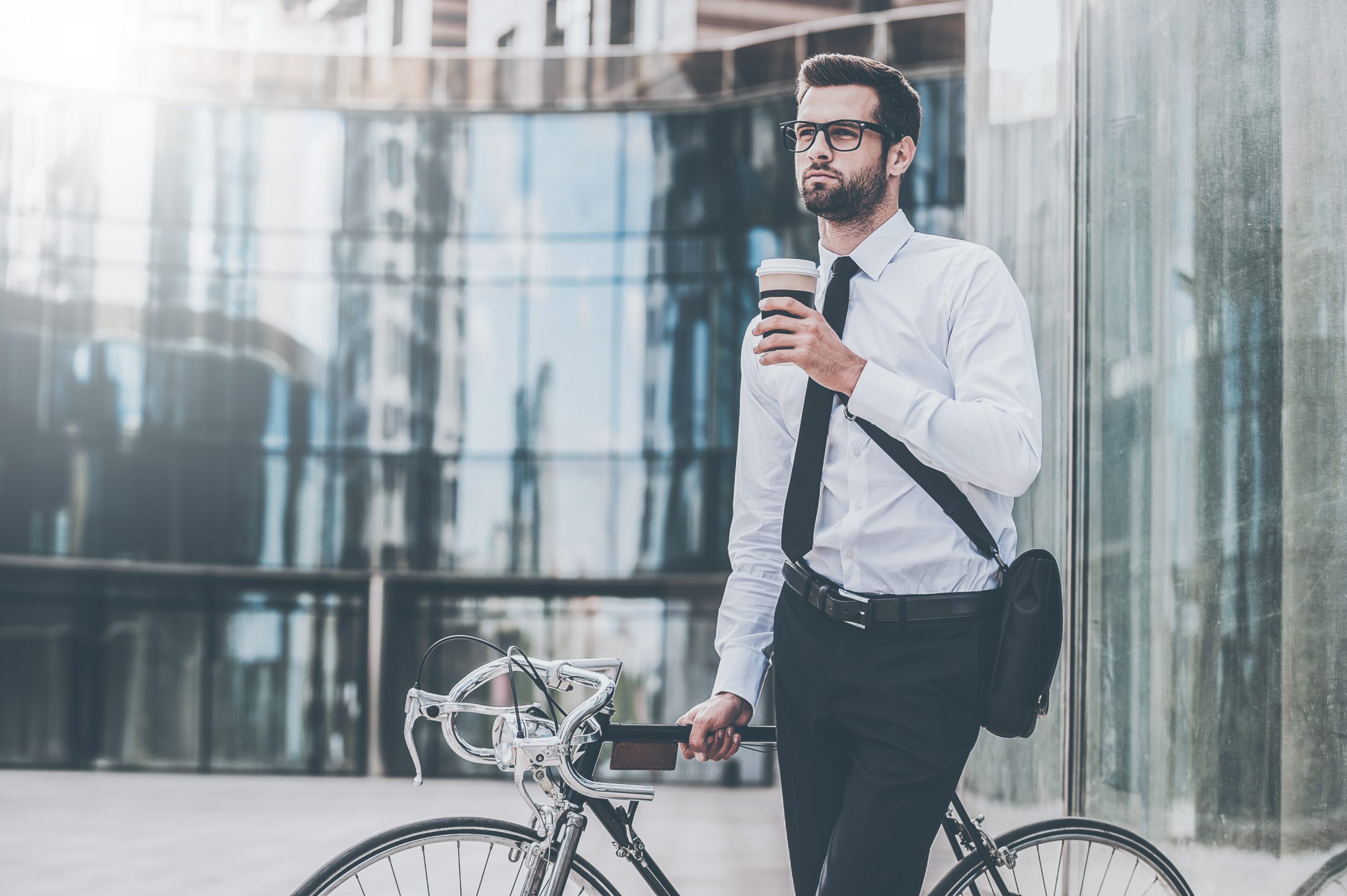 Cyclists enjoying coffee outside a cafe