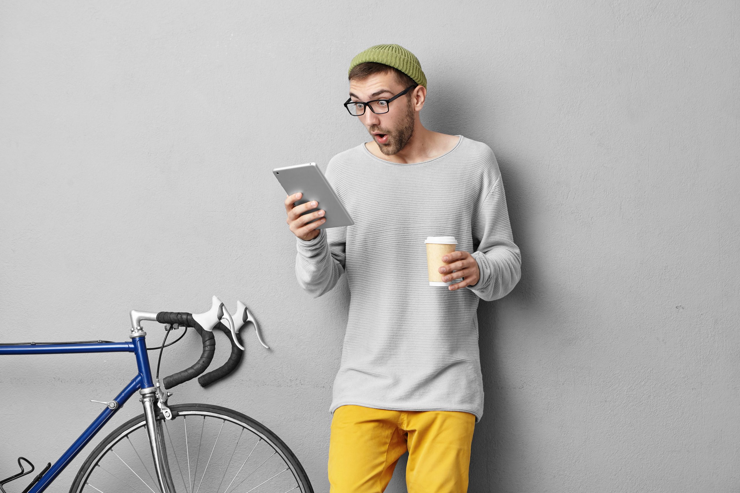 Cyclist enjoying coffee after ride
